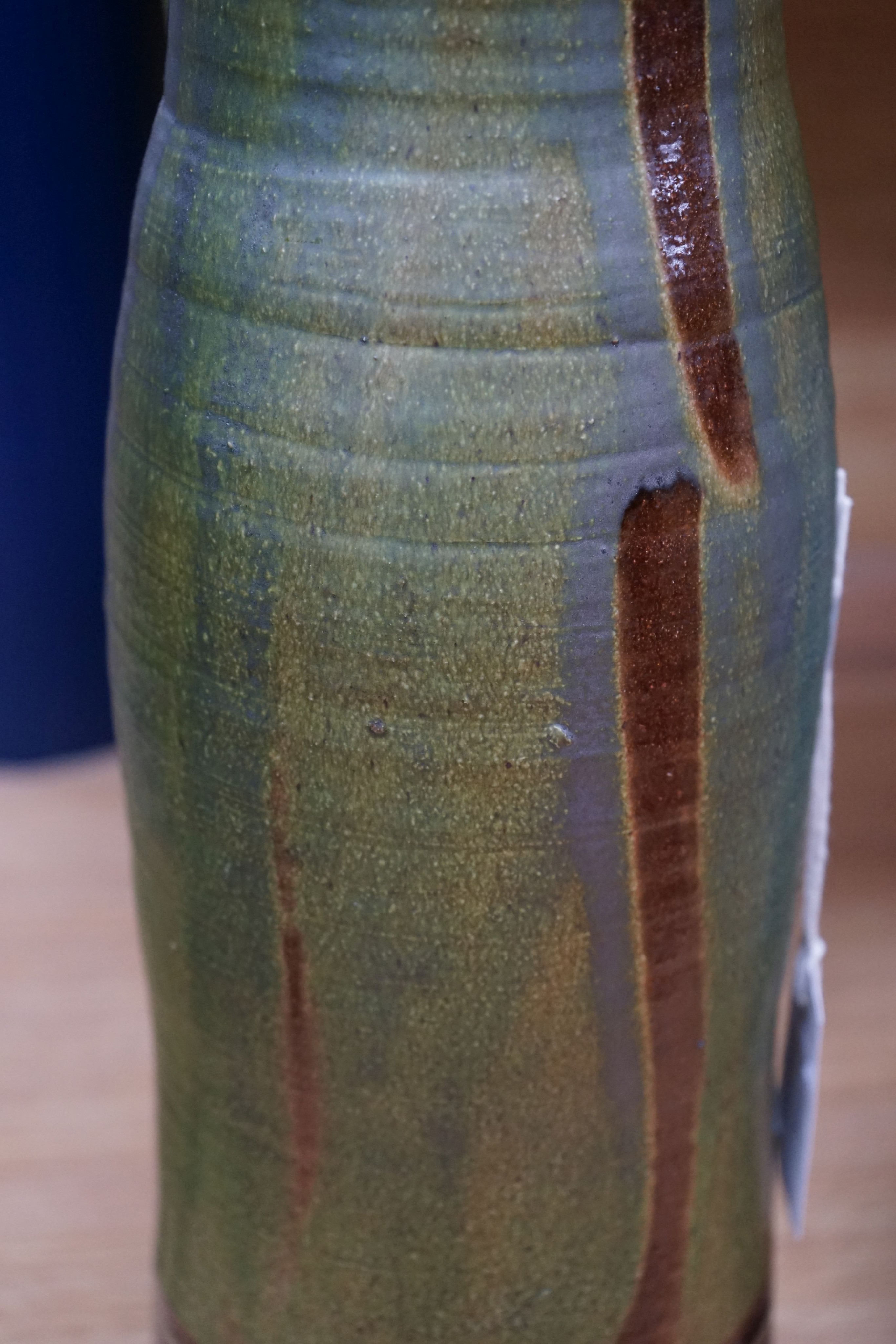 Clive Bowen (b.1943), a tall green glazed and brown slip decorated ewer, 59cm